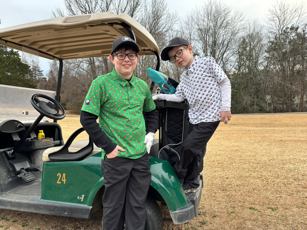 Junior kid golfers in youth golf polos
